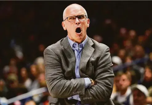  ?? Jeff Dean / Associated Press ?? UConn men’s basketball coach Dan Hurley wants to emulate the success of Hall of Famer Jay Wright, who retired from Villanova earlier this week with two national championsh­ips.