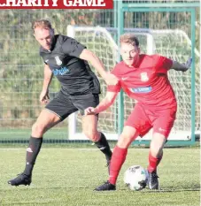 ??  ?? Close contest Amateurs star Steven Oates (red top) fends off a Hospice Select player