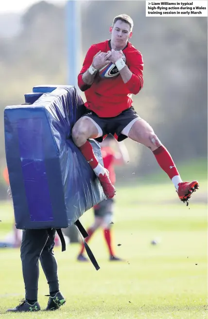  ??  ?? > Liam Williams in typical high-flying action during a Wales training session in early March