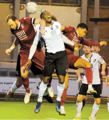  ?? Photo: Andrew Batt. ?? Sam Togwell, left, challenges for the ball.