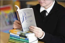  ?? AP FILE ?? “The Bluest Eye,” by Toni Morrison, is among books that were pulled from Forsyth Schools libraries after being labeled as having “pervasive sexually explicit” content. Book banning around the U.S. has reached a level not seen in decades.