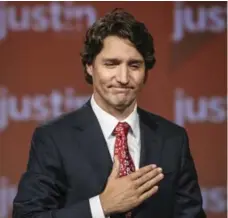  ?? DAVID COOPER/TORONTO STAR FILE PHOTO ?? The jury is out on whether the wildly popular placement of a hand on the heart is just a contrived message of sincerity for politician­s.