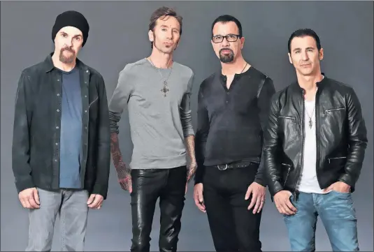  ?? [TROY SMITH] ?? Performing on Sunday at Rock on the Range: Godsmack, from left, Robbie Merrill, Shannon Larkin, Tony Rombola and Sully Erna