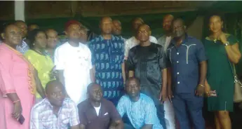  ??  ?? Abia State Commission­er for Education, Prof. Ikechi Mgbeoji (middle) with GSM dealers, after the MoU signing ceremony for building of ICT Centre and GSM Mall