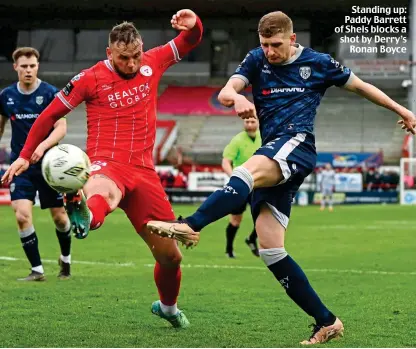  ?? ?? Standing up: Paddy Barrett of Shels blocks a shot by Derry’s Ronan Boyce