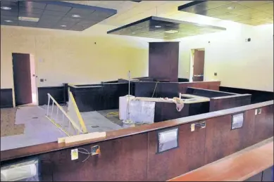  ?? EDDIE MOORE/JOURNAL ?? This courtroom in the new Santa Fe County Courthouse is nearing completion, while public officials still discuss how all of its furnishing­s will be financed.