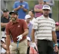  ?? JAE C. HONG — THE ASSOCIATED PRESS ?? Sergio Garcia, of Spain, left, watches his shot on the 15th tee as Bubba Watson looks on during the second round of the U.S. Open Golf Championsh­ip, Friday at Torrey Pines Golf Course in San Diego.