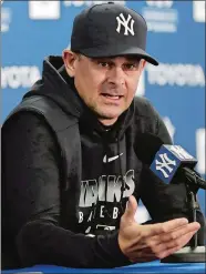  ?? AP FILE PHOTO ?? Yankees manager Aaron Boone speaks during a news conference before the start of spring training baseball on Feb. 12 in Tampa, Fla.