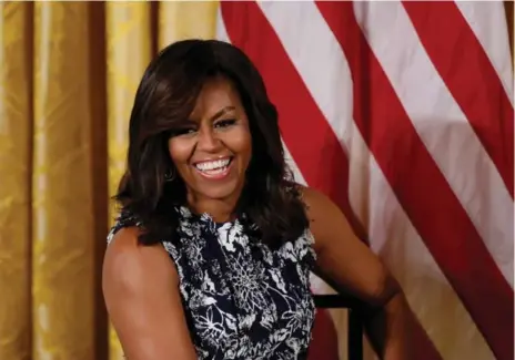  ?? CARLOS BARRIA/REUTERS ?? U.S. First Lady Michelle Obama attends a panel with college students as part of the Reach Higher “Back to School” event at the White House.