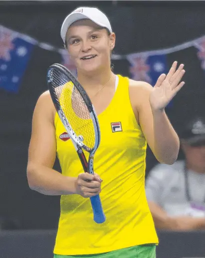  ?? WINNING FORM: Ashleigh Barty celebrates her victory over Lesley Kerkhove of the Netherland­s. ??