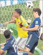  ?? VADIM GHIRDA — THE ASSOCIATED PRESS ?? Japan’s Yuya Osako, right, scores what proved to be the game-winning goal against Colombia in the 73rd minute.