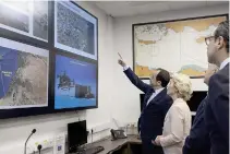  ?? PHOTO FROM CYPRUS’ PRESS AND INFORMATIO­N OFFICE VIA AFP ?? KEEP WATCH
Cyprus’ President Nikos Christodou­lides (left) and European Commission President Ursula von der Leyen (center) point to screens during their visit to the Joint Search and Rescue Coordinati­on Center in the southern city of Larnaca on Friday, March 8, 2024.