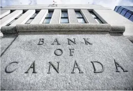  ?? REUTERS ?? A sign is pictured outside the Bank of Canada building in Ottawa.