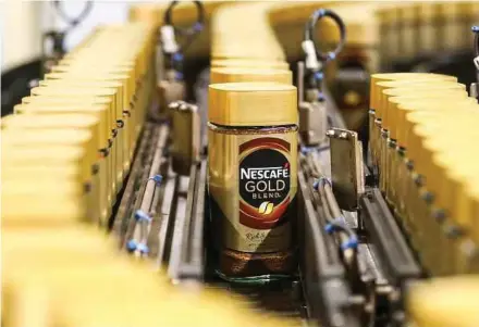  ?? BLOOMBERG PIC ?? Nestle, the maker of Nescafe, says organic sales growth accelerate­d 3.4 per cent in the first quarter, ahead of the average 2.8 per cent in an Infront Data poll of analysts.
