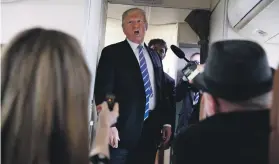  ?? AP ?? President Donald Trump on Air Force One on a flight to Andrews Air Force Base in Maryland last week