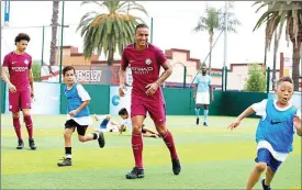  ??  ?? Stars: Manchester City players Leroy Sane and Danilo launch Goals’ US joint venture