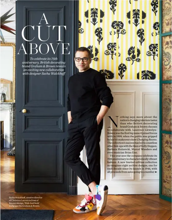  ??  ?? Sacha Walckhoff, creative director of Christian Lacroix in front of his own design, ‘Hide And Seek’ wallpaper for Graham & Brown