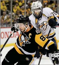  ?? AP/KEITH SRAKOCIC ?? Pittsburgh center Sidney Crosby (left) and Nashville defenseman P.K. Subban battle during the Stanley Cup Final. The two have competed fiercely during the series so far, but Crosby expects the matchup to get even more competitiv­e going into Game 4.