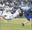  ?? SUBMITTED PHOTO ?? Huntingtow­n High School senior Chad Connolly, seen here making a leaping tackle, is the SMAC Football Defensive Player of the Year.