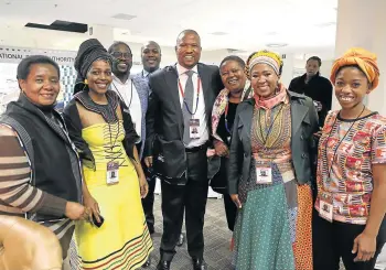  ?? Picture: MARK ANDREWS ?? Economic developmen­t MEC Oscar Mabuyane, centre, with some of the manufactur­ers at the Brics Summit at the ICC in East London