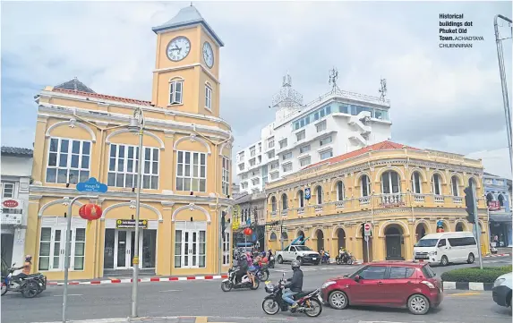  ?? ACHADTAYA CHUENNIRAN ?? Historical buildings dot Phuket Old Town.