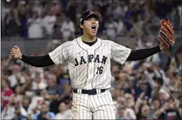  ?? AP photos ?? Japan pitcher Shohei Ohtani celebrates after getting the final out of Japan’s 3-2 victory over the United States in the World Baseball Classic championsh­ip game Tuesday.