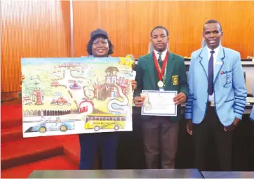  ?? ?? NOTHING FOR US WITHOUT US ……. Mutare Boys’ High School Form Two learner, Ian Mubonane (centre), receives the 2024 colouring and drawing competitio­n gold medal from Mutare City Council’s director for housing and community services, Mrs Emma Mandiziba (left), while junior mayor, Makomborer­o Madamombe looks on at the Civic Centre last Friday. The concepts in the drawing will be used in the setting up of the Children’s Park.