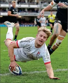  ??  ?? CLINCHER: Rob Lyttle dives over to score a try and (left) Ulster head coach McFarland