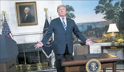  ?? Doug Mills/The New York Times ?? President Donald Trump speaks to reporters Tuesday in the Diplomatic Room of the White House after announcing he is pulling the United States out of the Iran nuclear deal.