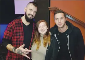  ?? Special to The Daily Courier ?? Robb Nash, exchange student Felicia Robert and Nash’s drummer Jonny Holliday pose for a photo after Nash’s public show in Vernon.