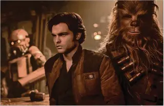  ?? COURTESY OF LUCASFILM PHOTO ?? Alden Ehrenreich as Han Solo, with Chewbacca (Joonas Suotamo), in “Solo: A Star Wars Story.”