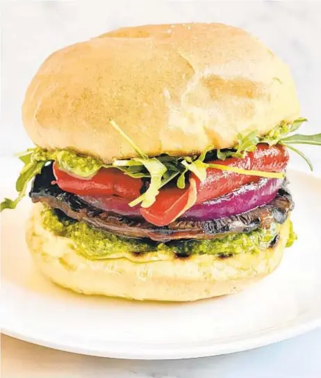 ?? KELLI FOSTER/THEKITCHN.COM ?? The mix of color and texture in these vegan burgers will keep you coming back for more.