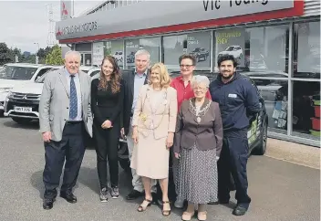  ??  ?? The visitors from Germany at the Vic Young Ltd dealership in South Shields.