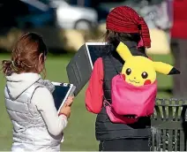  ?? PHOTO: DEREK FLYNN/FAIRFAX NZ ?? Even Pokemon Go was not without unintended consequenc­es when armed robbers used it to lure players into a trap in Missouri.