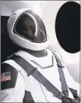  ?? SPACEX VIA THE ASSOCIATED PRESS ?? Elon Musk shows a new SpaceX spacesuit. Musk indicated that his spacesuit is functional and tested to withstand pressure loss while traveling through space. He noted how “incredibly hard” it was to marry aesthetics and survivabil­ity.