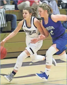  ?? / Scott Herpst, file photo ?? Gordon Lee’s Emma McGraw drives up court past a Trion defender. The Lady Trojans were scheduled to face Trion again at 6 p.m. on Tuesday in the Girls’ 6-A Tourmanent at Christian Heritage.