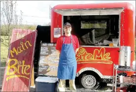  ?? Lynn Atkins/The Weekly Vista ?? Matt Schmit enjoys making breakfast for commuters in his new food Truck, the Main Bite, in front of the Artist Retreat Center just off of Highway 71.