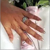  ?? PHOTO PROVIDED ?? The center diamond from this engagement ring fell out of its setting while Kana ChiMurenbe­eld was passing through the security checkpoint at Albany Internatio­nal Airport earlier this month.