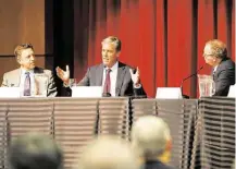  ?? Karen Warren / Houston Chronicle ?? Shell Oil President Marvin Odum, center, speaks Tuesday at the University of Houston energy symposium.