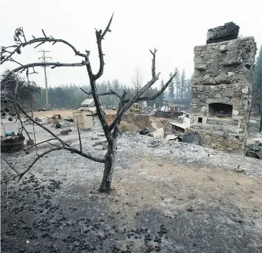  ?? JASON PAYNE / POSTMEDIA NEWS ?? The remnants of a private residence on Highway 20, west of Williams Lake, B.C., that burned down earlier this month after a wildfire raged through the Chilcotin.