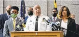  ?? BARBARA HADDOCK TAYLOR/ BALTIMORE SUN ?? Baltimore Mayor Brandon Scott, from left in front, police commission­er Michael Harrison, and State’s Attorney Marilyn Mosby participat­e in a news conference to announce arrest in the shooting of Baltimore officer Keona Holley.