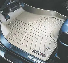  ??  ?? Weather Tech floor mats will help keep clothing dry.