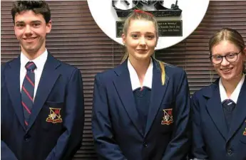  ?? Photos: USQ Photograph­y ?? LEGAL ARGUMENT: Toowoomba SHS moot team (above, from left) Kody Buchan, Kaitlyn Cairns and Jemilla Strode Smith will compete in the grand final of the USQ Secondary School Moot Competitio­n.