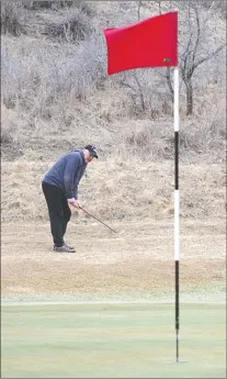  ?? NEWS PHOTO SEAN ROONEY ?? Ignatius Philpott hits a shot on the first hole at Paradise Valley Golf Course Monday.