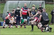  ??  ?? Wicklow’s Luke Gersekowsk­i comes under pressure at Ashtown Lane.