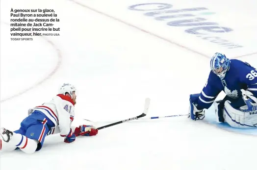  ?? PHOTO USA
TODAY SPORTS ?? À genoux sur la glace, Paul Byron a soulevé la rondelle au-dessus de la mitaine de Jack Campbell pour inscrire le but vainqueur, hier.