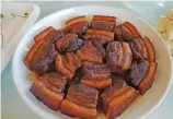  ??  ?? Dongpo braised pork.