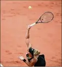  ?? Thibault Camus / Associated Press ?? France's Leolia Jeanjean serves against No. 8 seed Karolina Pliskova in a 6-2, 6-2 win.