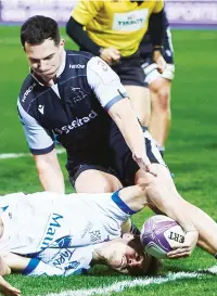  ??  ?? Star man: Antoine Bouzerand touches down for Castres’ first try