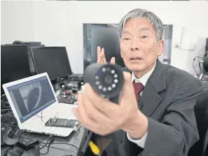  ??  ?? LEFT
Han explains a specialist warning system for autonomous vehicles under developmen­t.